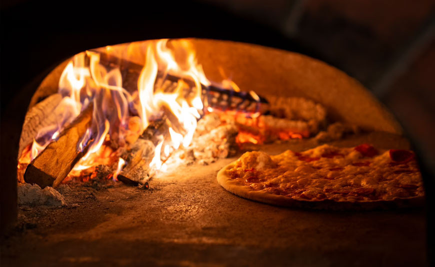 La cottura nel forno a legna La cottura nel forno a legna